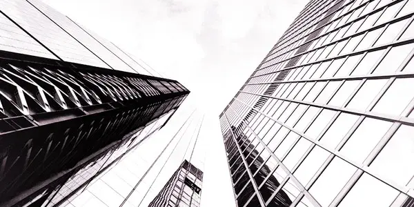Modern Glass Skyscrapers looming overhead