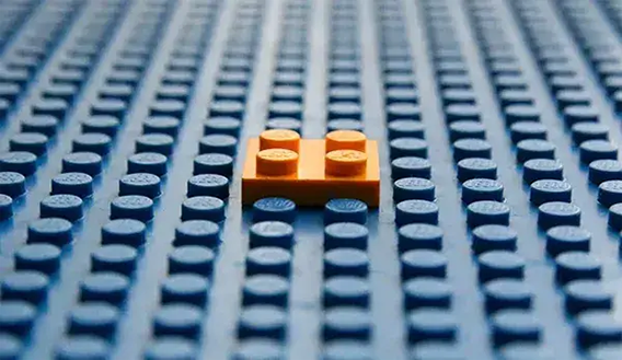 Close-up image with shallow depth of field of two modular play system components
