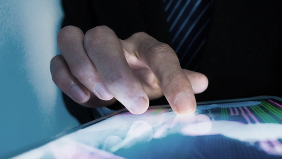 Closeup shot of someone using a digital tablet device